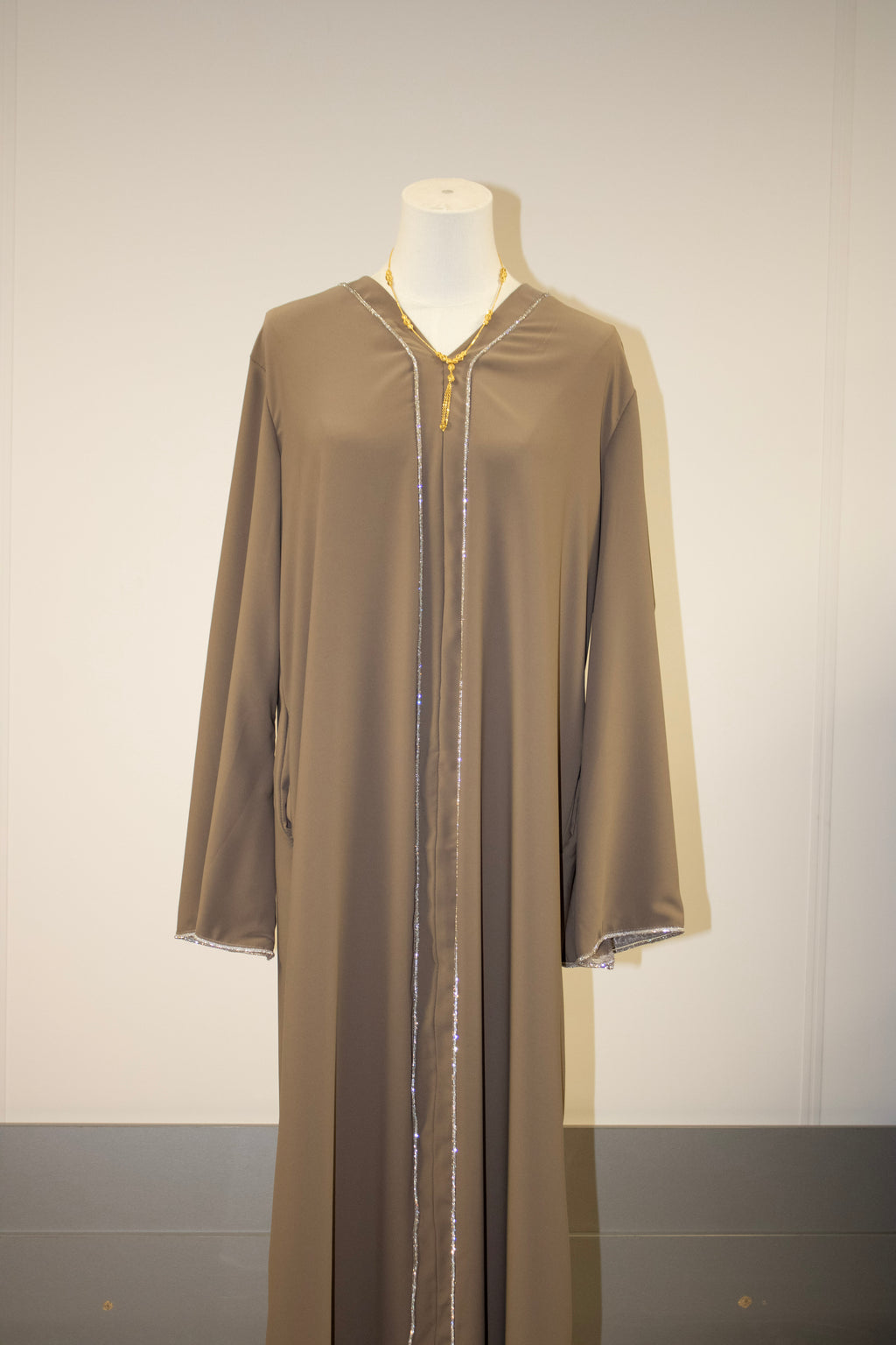 dark baige abaya lines