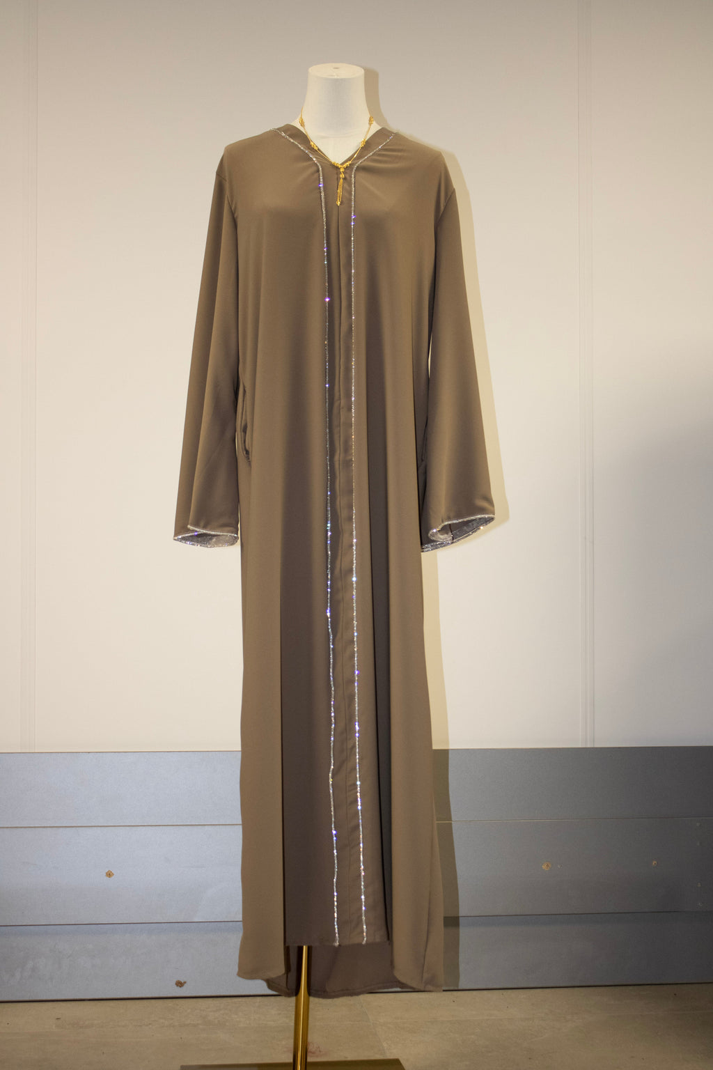 dark baige abaya lines